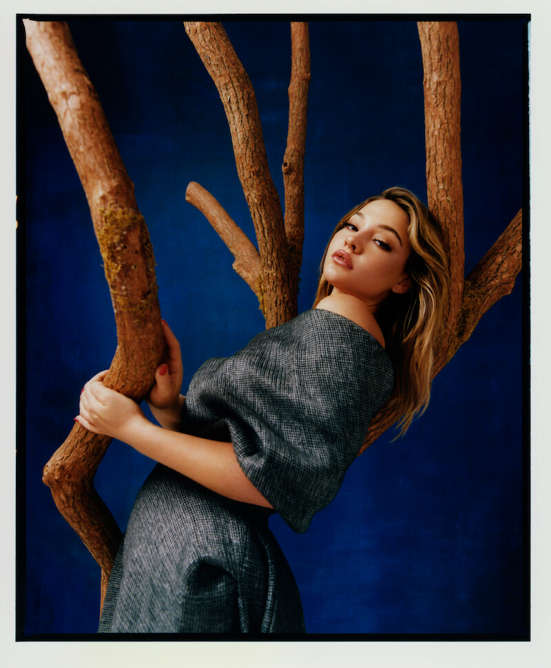 Madelyn Cline on a tree stand