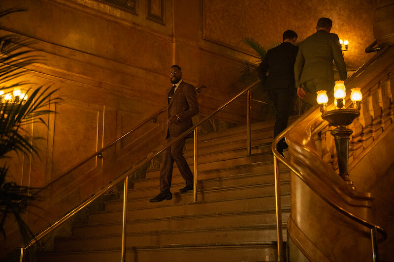Colman Domingo as Muncie Daniels walks down a grand staircase in Season 1 of ‘The Madness.’