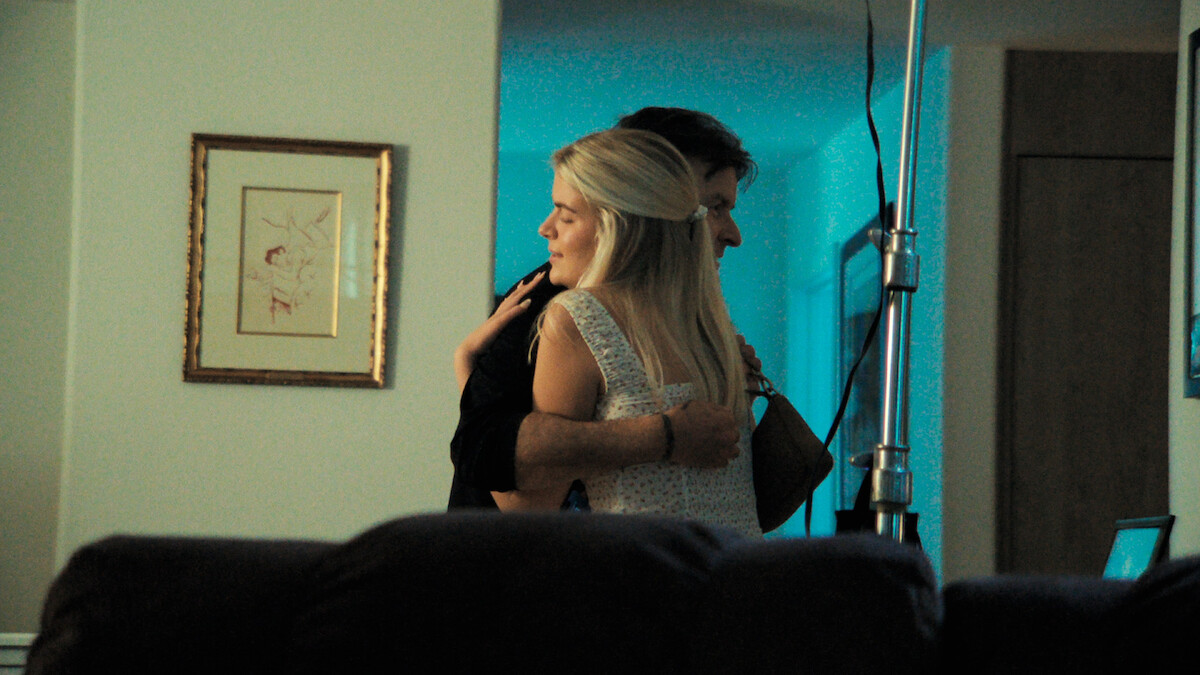 Charlie Sheen hugs daughter Lola behind the scenes.