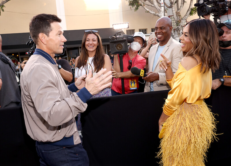 Mark Wahlberg and Regina Hall share a laugh at the Me Time premiere. - ‘Me Time’ Red Carpet Photos