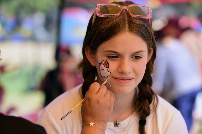 Face painting and other activities abound at the Netflix Family Summer kick off event.