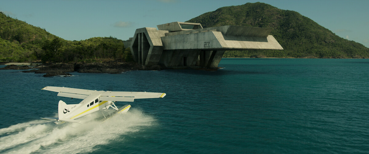 Abnesti arrives at the facility in a de Havilland plane - The Beauty of Brutalism: the Design References in ‘Spiderhead’ Revealed