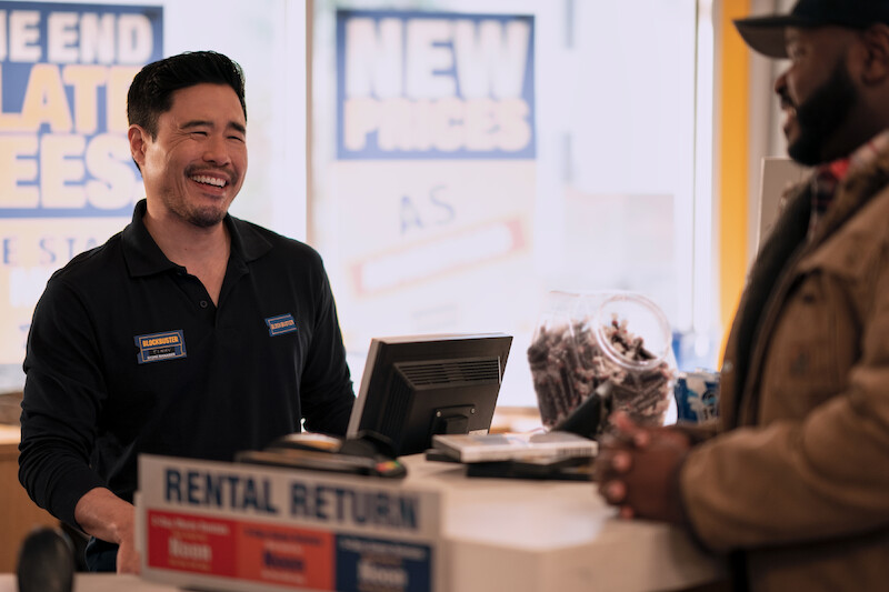 Timmy (Park) with a customer - ‘Blockbuster’ First Look Photos