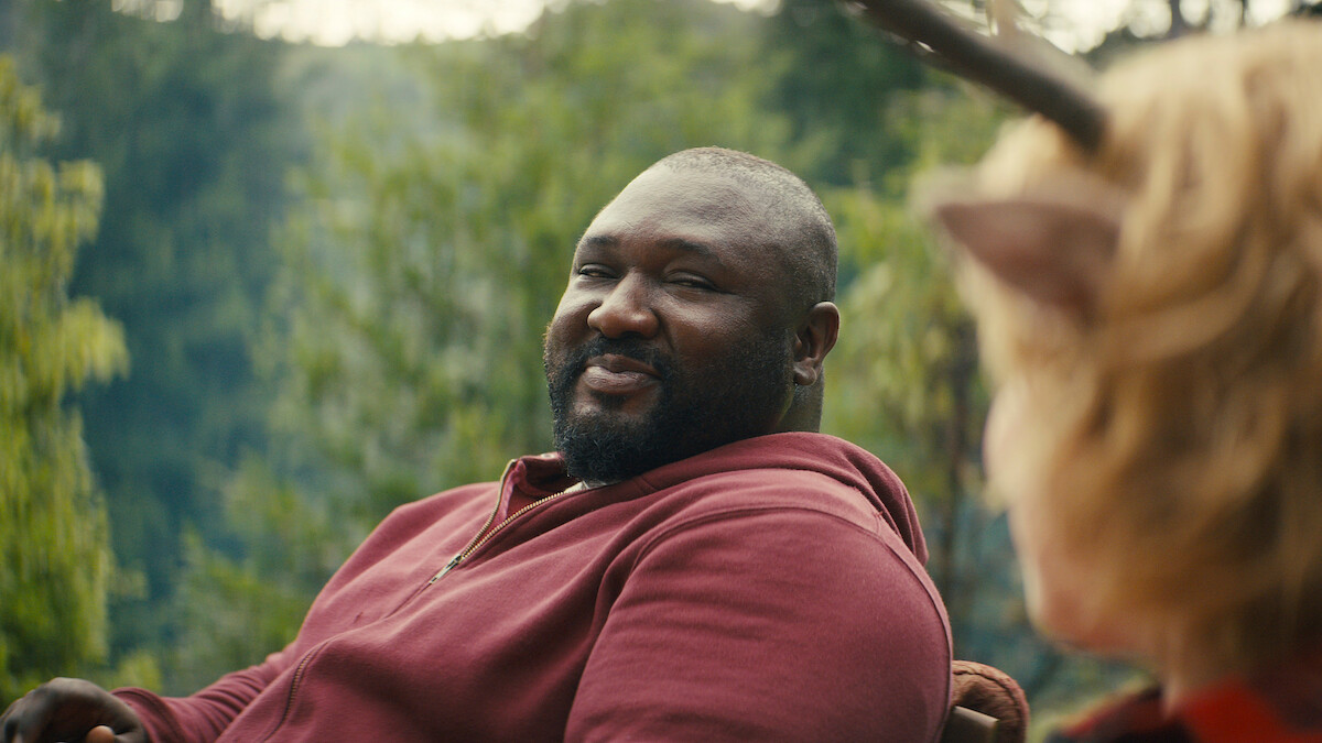 Nonso Anozie as Jepperd smiles at Christian Convery as Gus in Season 3 of ‘Sweet Tooth’