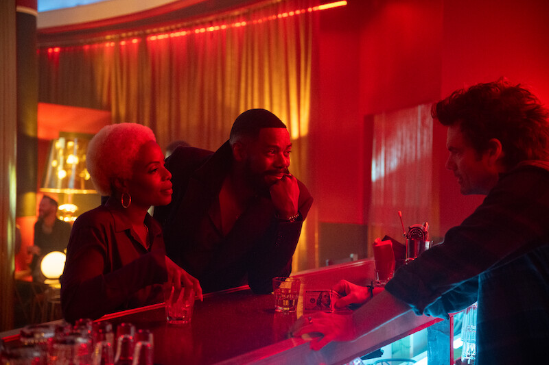 Marsha Stephanie Blake as Elena and Colman Domingo as Muncie Daniels speak to a bartender in Season 1 of ‘The Madness.’