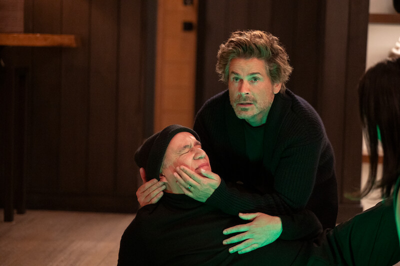 Fred Armisen as Leslie lays on the ground as Rob Lowe as Ellis fusses over him in Season 2 of 'Unstable'