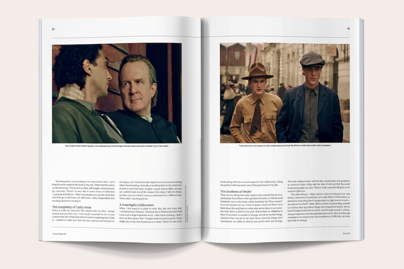 Magazine spread with two film stills: left page shows two men talking indoors with warm lighting, right page shows two young men in period costumes standing outdoors on a city street, surrounded by vintage buildings and background actors.