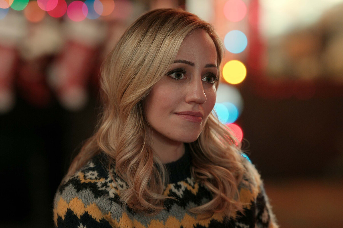 Zibby Allen as Brie Sheridan stands with a concerned expression in Season 5 of ‘Virgin River.’