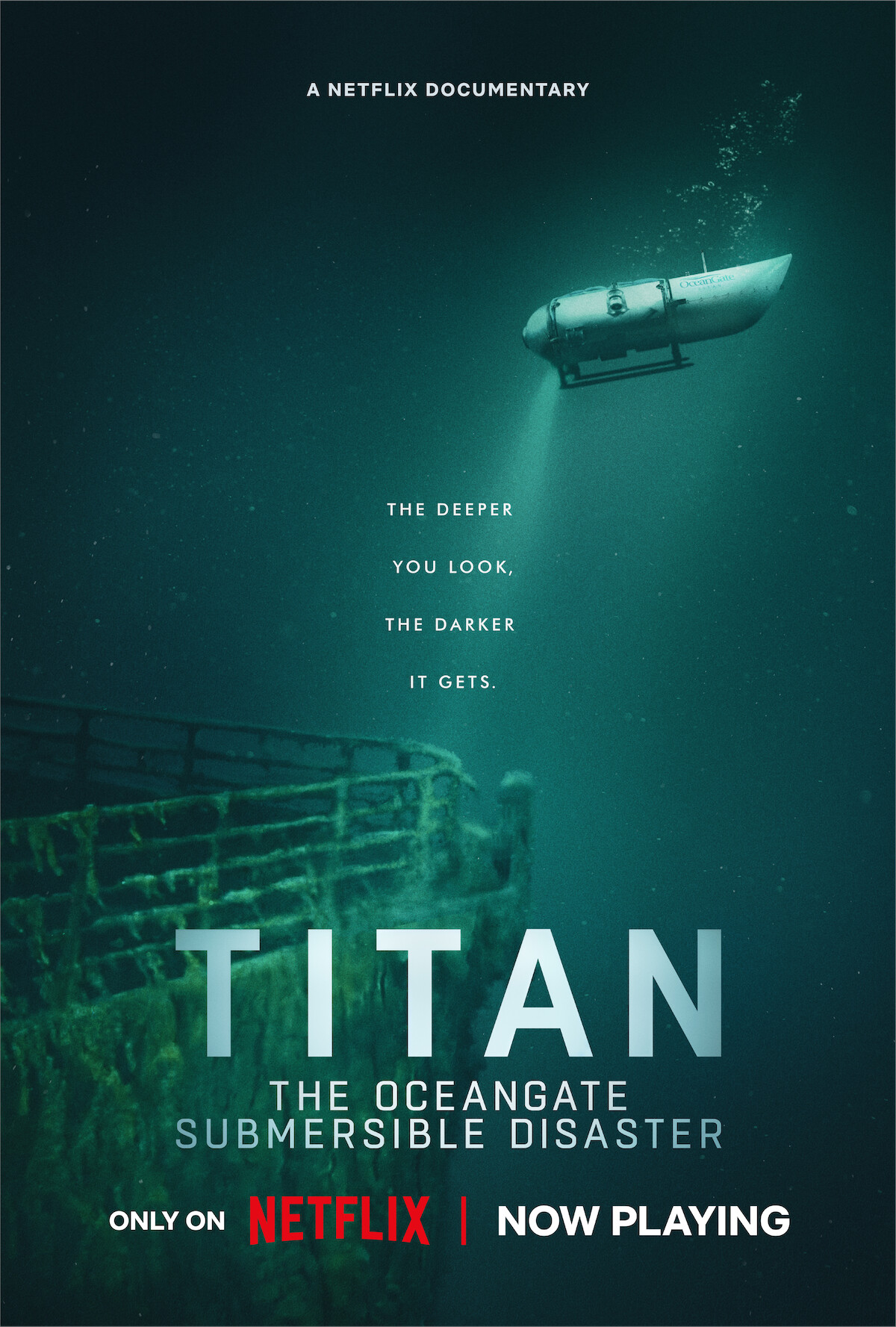 A submersible deep underwater shining a spotlight on the wreck of the Titanic bow