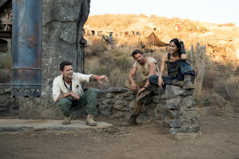 (L-R) Director/writer/producer Zack Snyder , Michiel Huisman as Gunnar and Sofia Boutella as Kora on the set of Rebel Moon. 