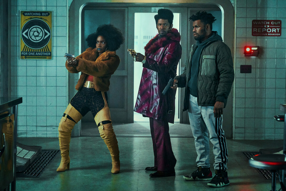 Teyonah Parris as Yo-Yo, Jamie Foxx as Slick Charles and John Boyega as Fontaine in ‘They Cloned Tyrone.’