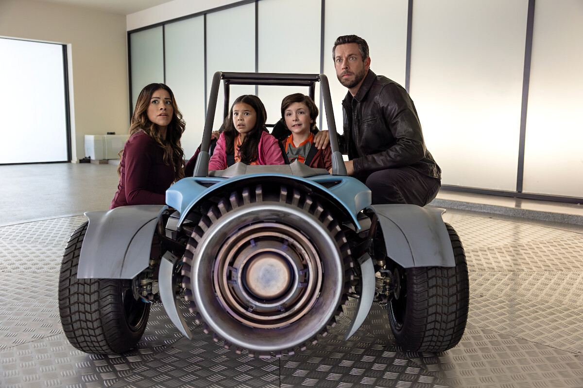 Gina Rodriguez as Nora Torrez, Everly Carganilla as Patty Torrez, Connor Esterson as Tony Torrez, and Zachary Levi as Terrence Torrez in ‘Spy Kids: Armageddon’.