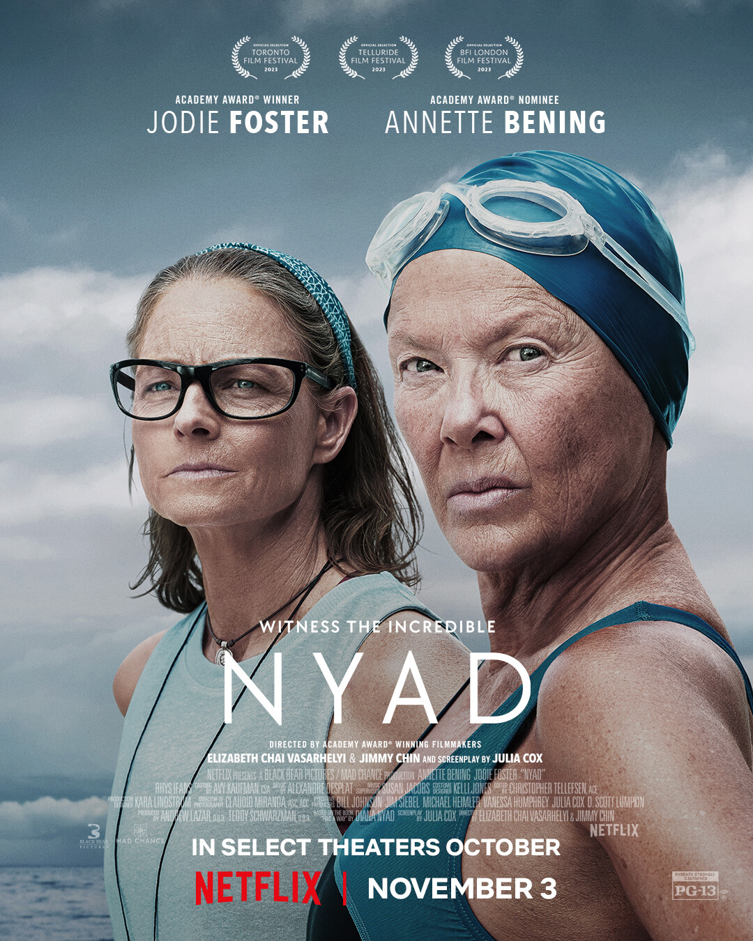 ‘NYAD’ Key Art - Annette Bening and Jodie Foster standing on a beach