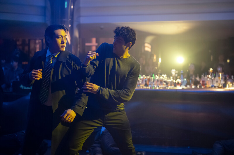 Teo Yoo as Jang Kyun Kim and Noah Centineo as Owen Hendricks in Season 2 of 'The Recruit'