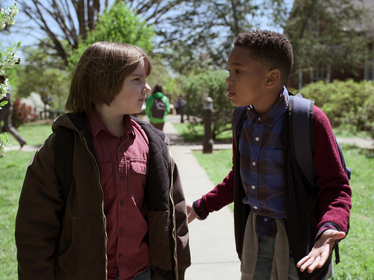 A close up of Griffin Robert Faulkner playing Brayden Mills with his friend Dion on 'Raising Dion'