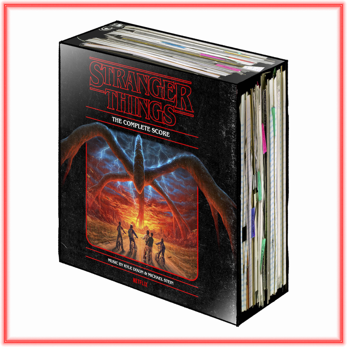 Box set of "Stranger Things: The Complete Score" with dramatic cover art showing four characters facing a giant monster in a fiery, stormy landscape, surrounded by record sleeves, Netflix branding visible.