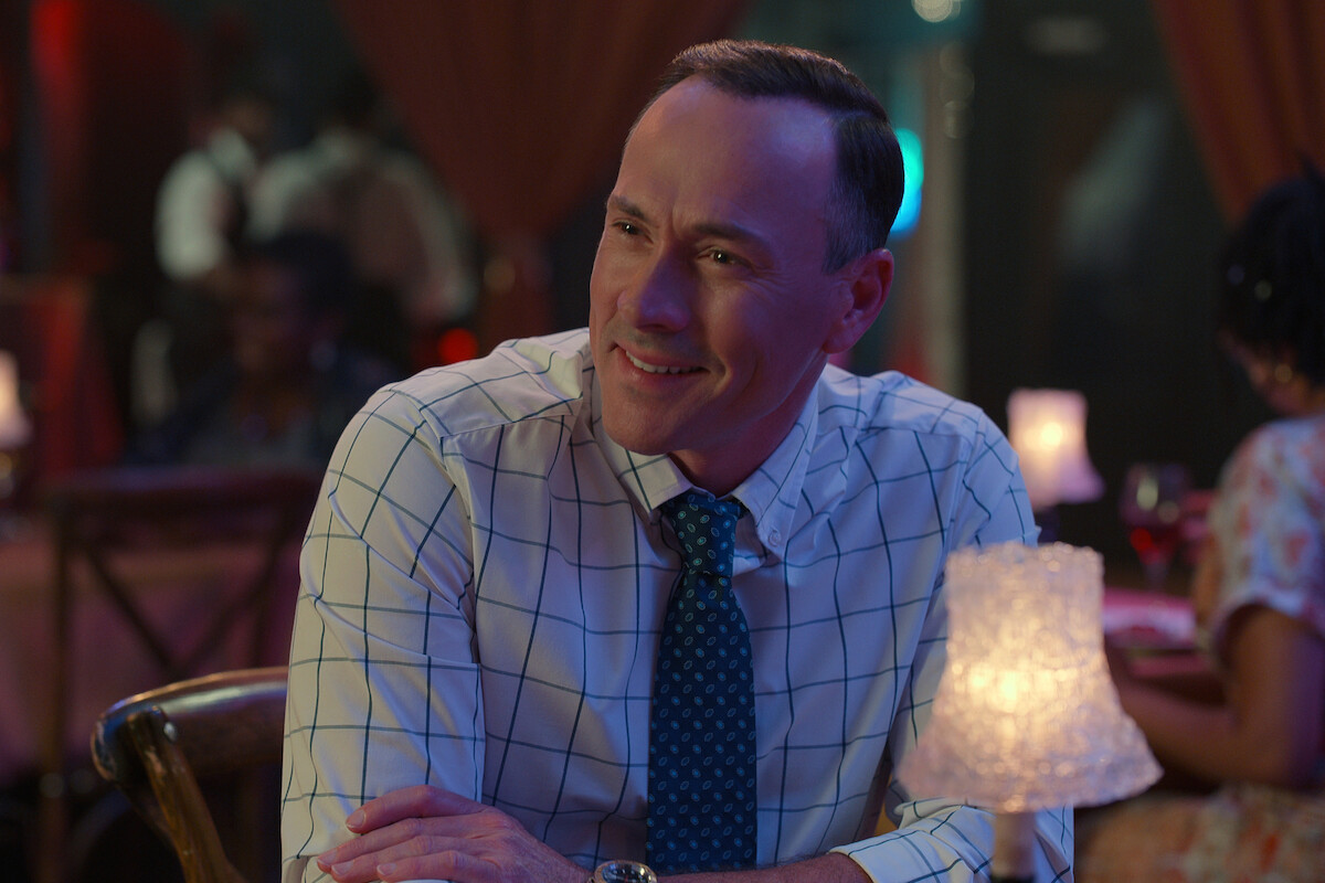 Chris Klein as Bill Townsend smiles at a restaurant table in Season 3 of ‘Sweet Magnolias.’