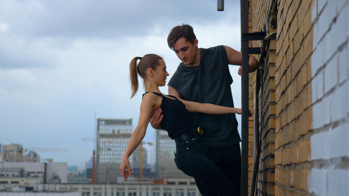 Ivan Beerkus and Angela Nikolau on the side of a building