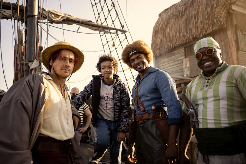 Peter Gadiot as Shanks, Colton Osorio as Young Luffy, Stevel Marc as Yasopp the Great, Ntlanhla Morgan Kutu as Lucky Roux posing for a photo on the set of Season 1 of 'One Piece.'