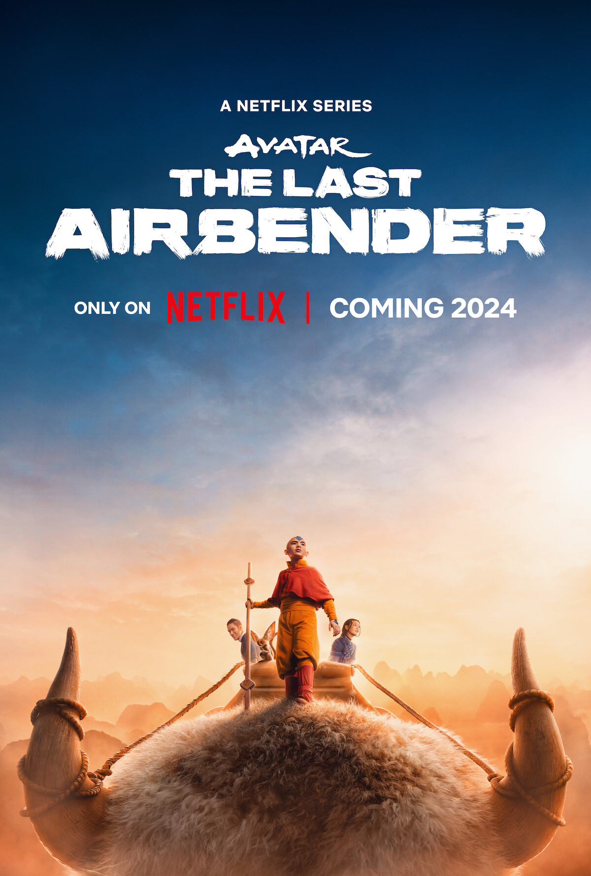 Gordon Cormier as Aang rides Appa in this key art for Season 1 of 'Avatar: The Last Airbender'
