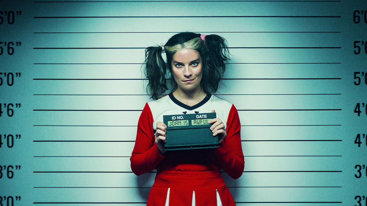 Annie Murphy as Joan gets a mugshot taken in the "Joan is Awful" episode of 'Black Mirror' Season 6