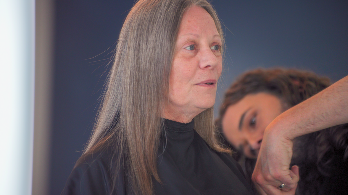 Paula gets her hair trimmed.