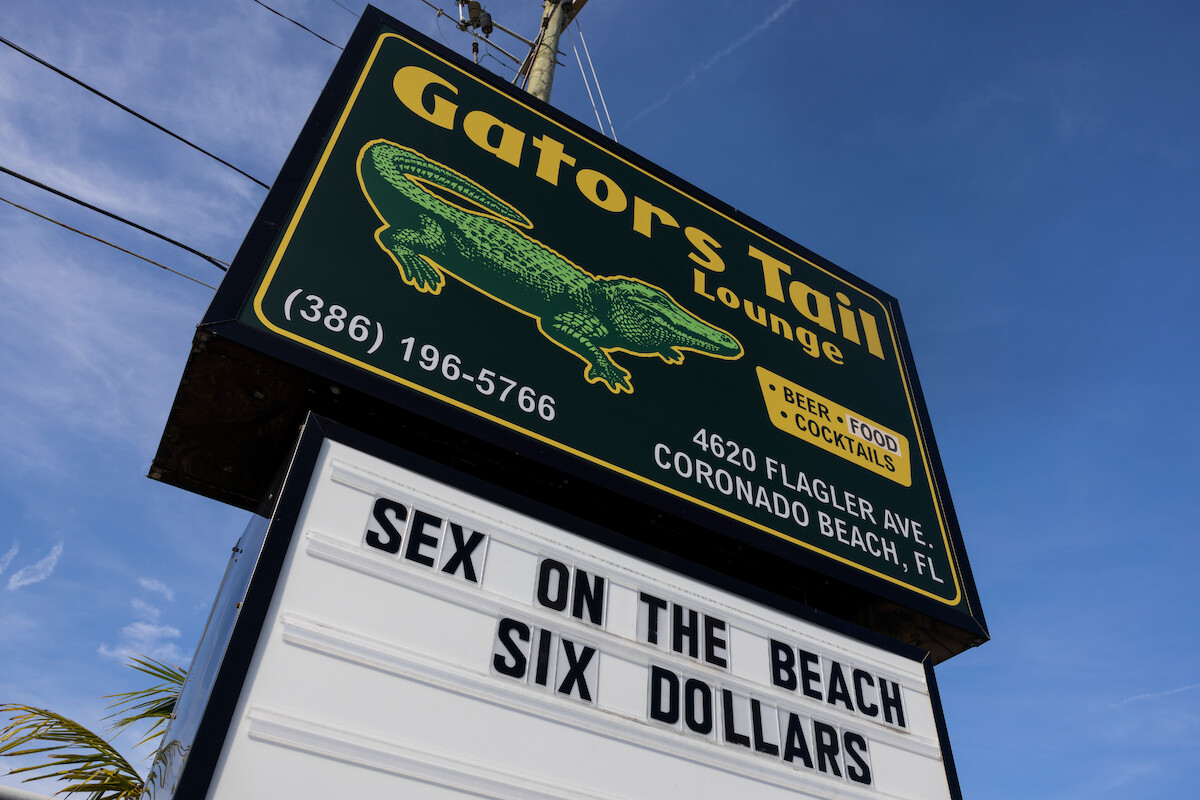 Gators Tail Lounge sign in Florida Man Season 1.