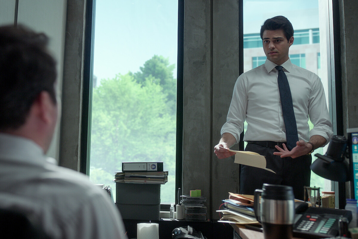Noah Cenineo standing in an office.