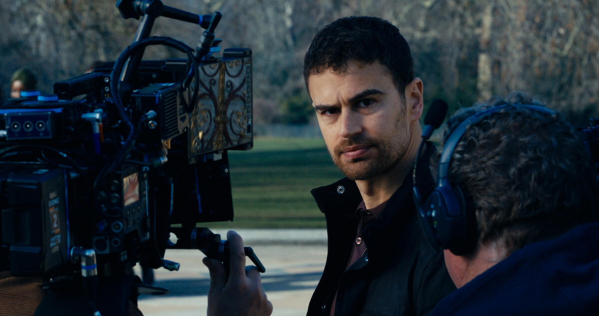 Behind the scenes shot of Theo James as Eddie Horniman working with the crew on the set of season 1 of 'The Gentlemen'
