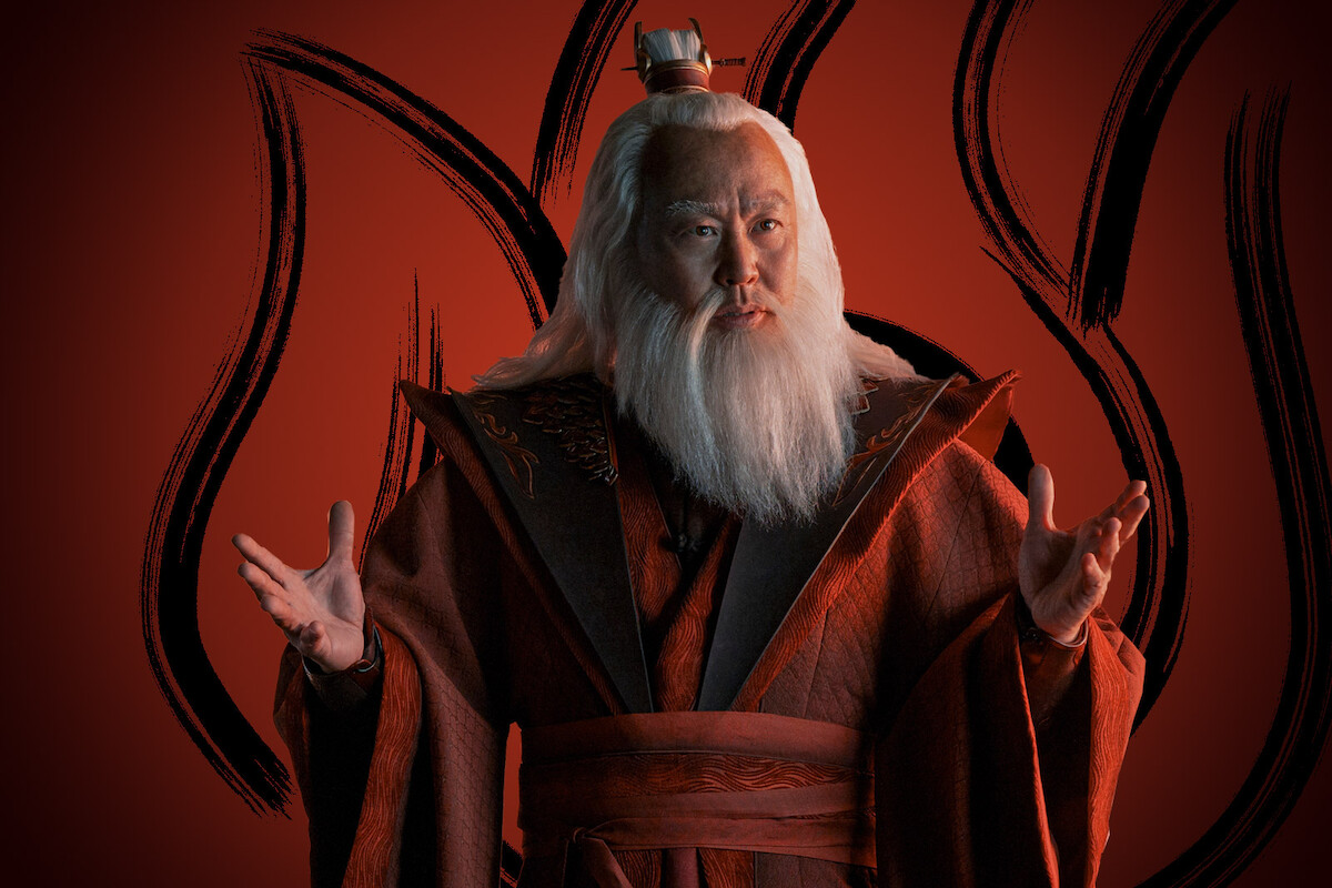C. S. Lee as Avatar Roku wears red Fire Nation robes in season 1 of ‘Avatar: The Last Airbender’
