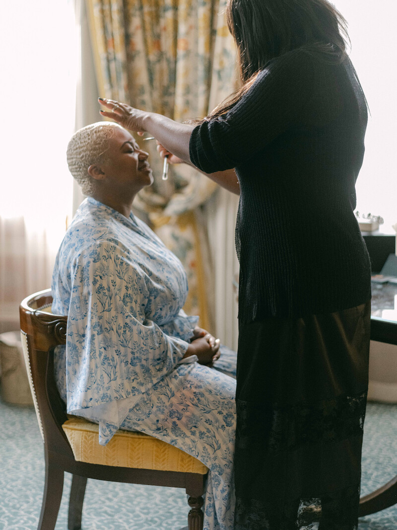 Tiffany Rae get her makeup done in 'The Event of the Season: A Bridgerton Wedding'