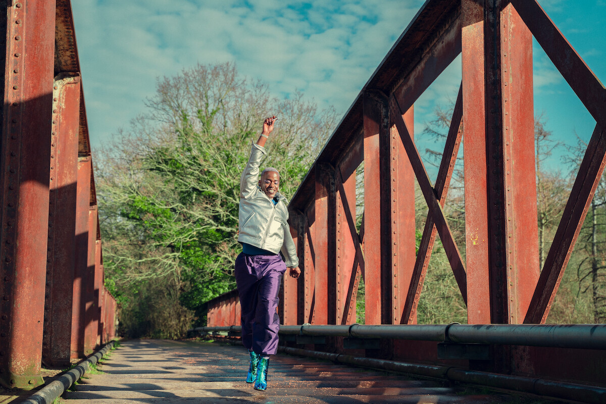Ncuti Gatwa as Eric jumps on a bridge in Season 4 of ‘Sex Education.’