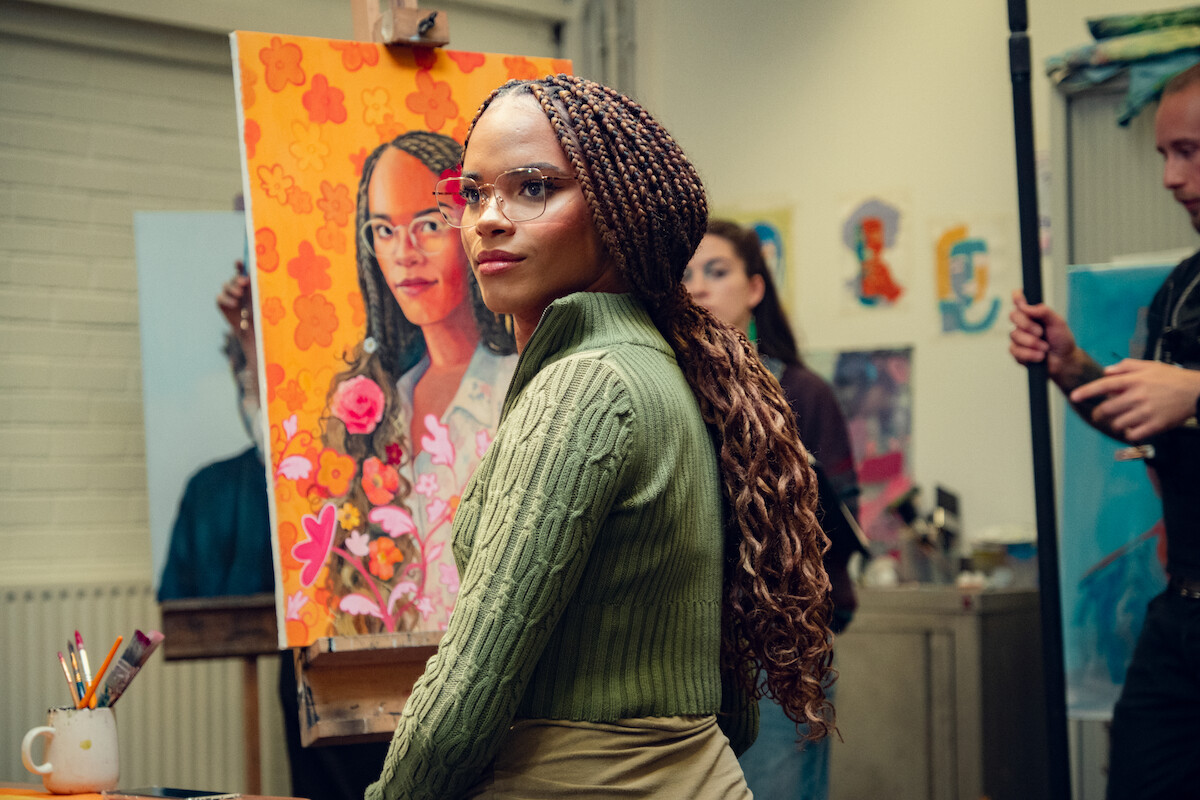 Yasmin Finney as Elle paints a self-portrait in Season 3 of ‘Heartstopper.’