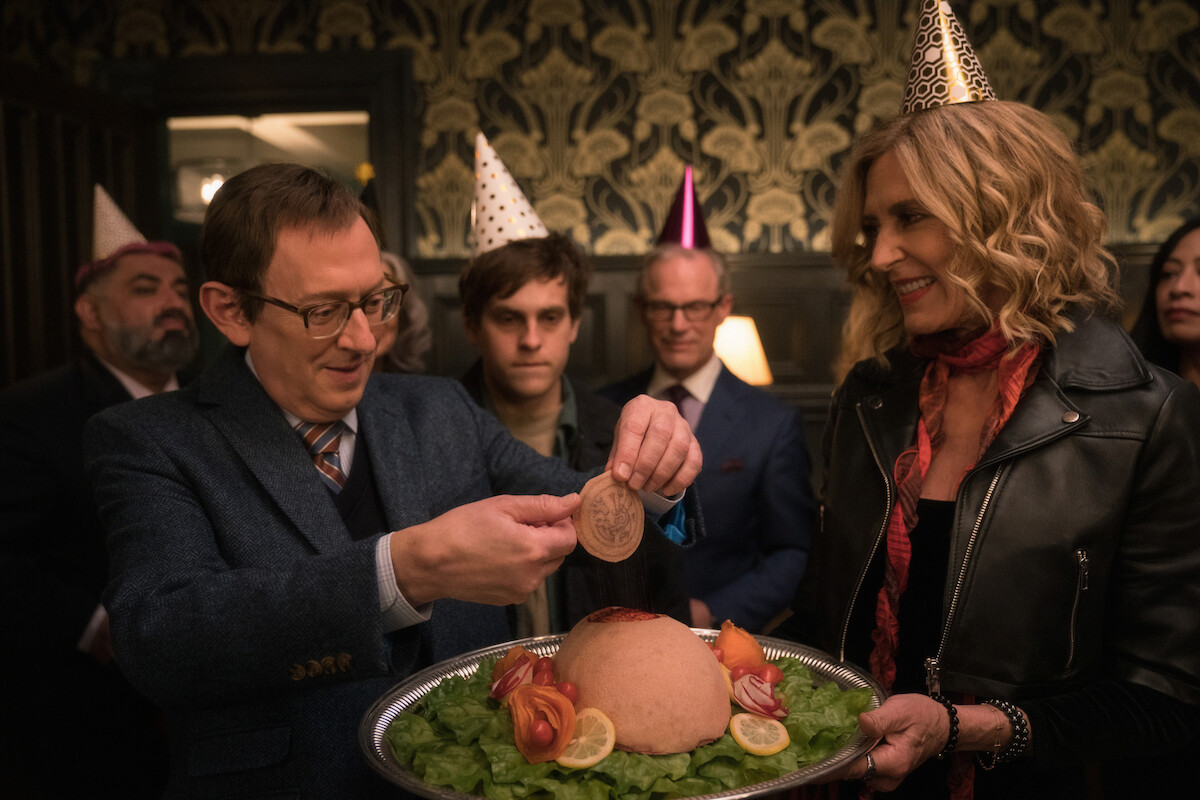 Michael Emerson as Leland Townsend, Taylor Trensch as Mitch Otterbean, and Christine Lahti as Sheryl in an image from the series ‘Evil’