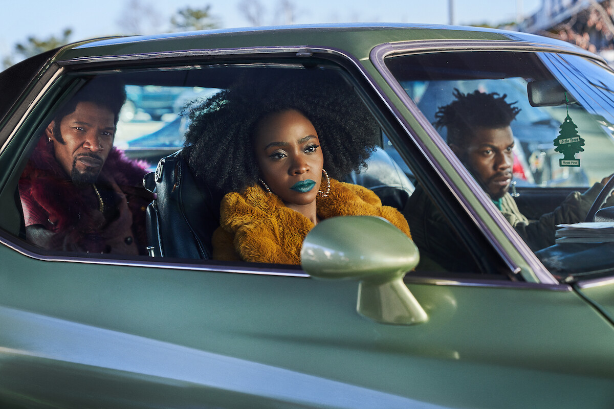 Jamie Foxx as Slick Charles, Teyonah Parris as Yo-Yo and John Boyega as Fontaine in ‘They Cloned Tyrone.’
