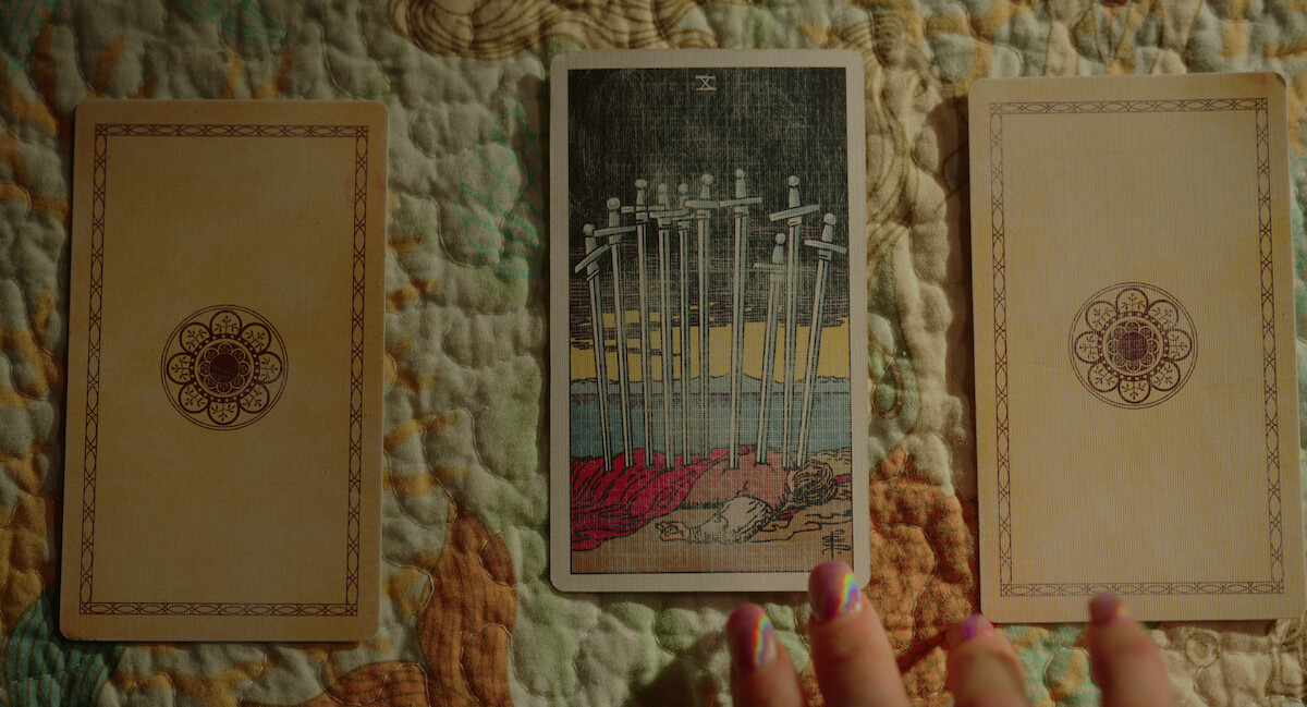Delly pulls tarot card in Florida Man Episode 4.
