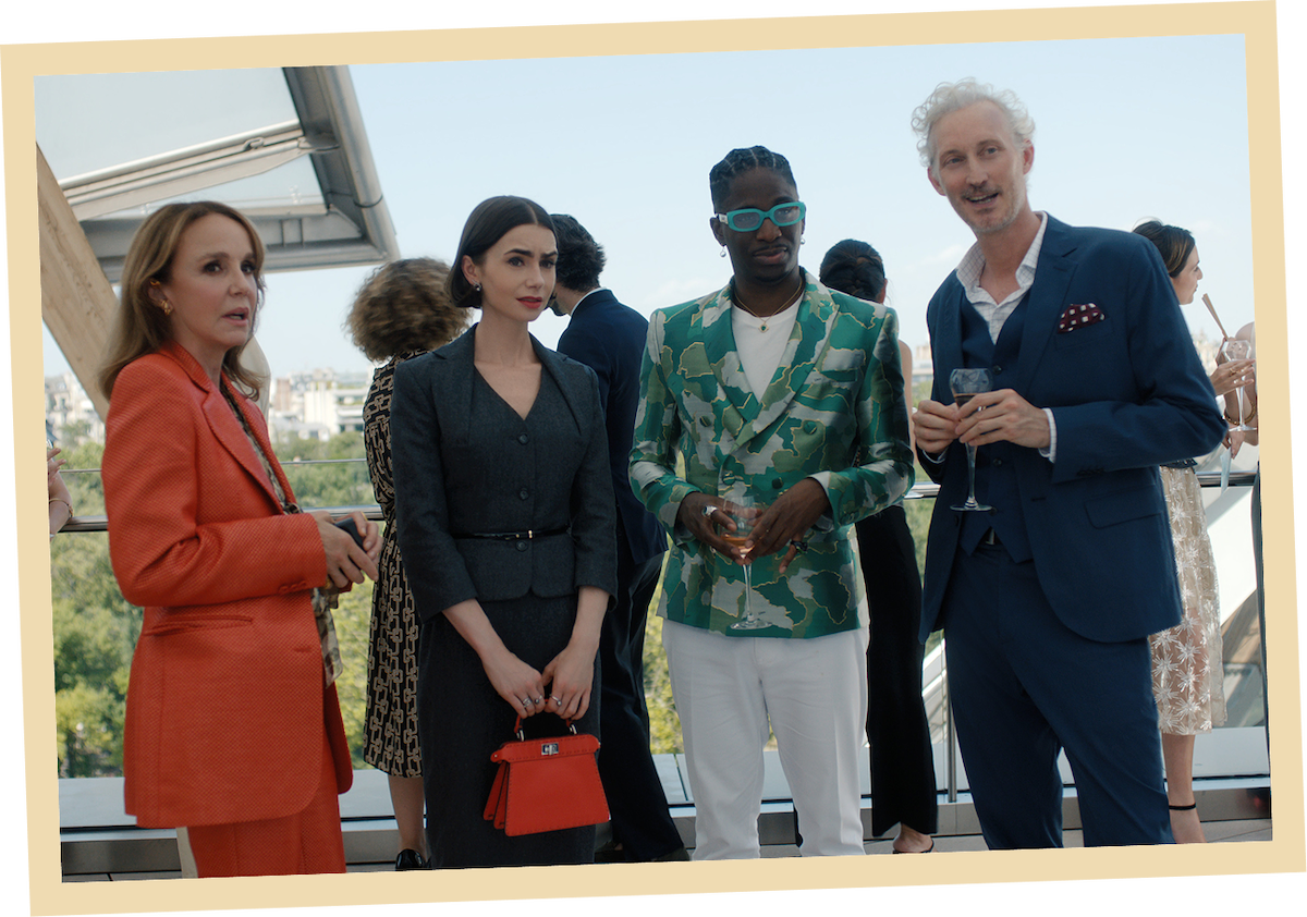 Philippine Leroy-Beaulieu as Sylvie Grateau, Lily Collins as Emily, Samuel Arnold as Julien and Bruno Gouery as Luc in ‘Emily in Paris’ Season 5.