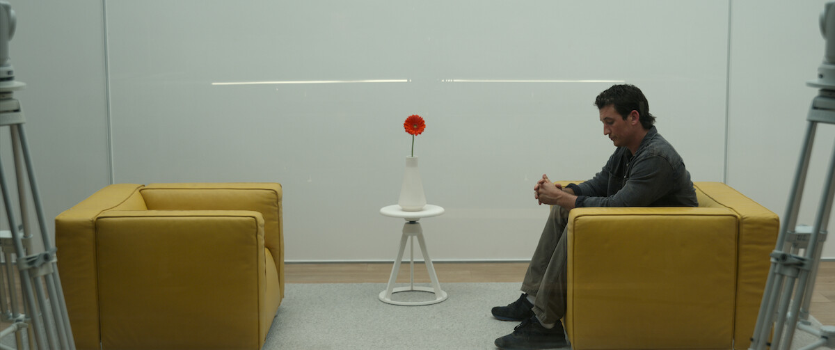Jeff (Miles Teller) awaits another inmate - The Beauty of Brutalism: the Design References in ‘Spiderhead’ Revealed