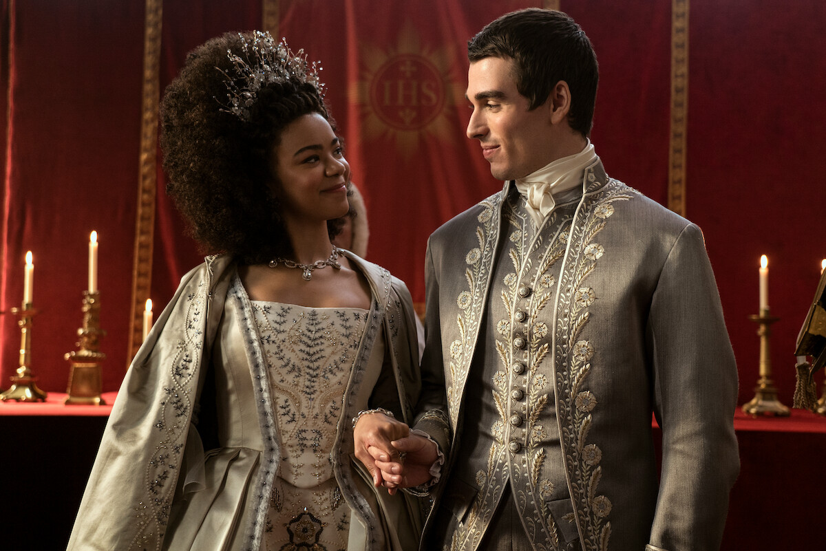 India Amarteifio as Young Queen Charlotte and Corey Mylchreest as Young King George.