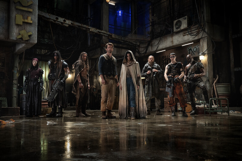 Doona Bae as Nemesis, Ray Fisher as Bloodaxe, Staz Nair as Tarak, Michiel Huisman as Gunnar, Sofia Boutella as Kora, Charlie Hunnam as Kai, E. Duffy as Milius and Djimon Hounsou as Titus in 'Rebel Moon'