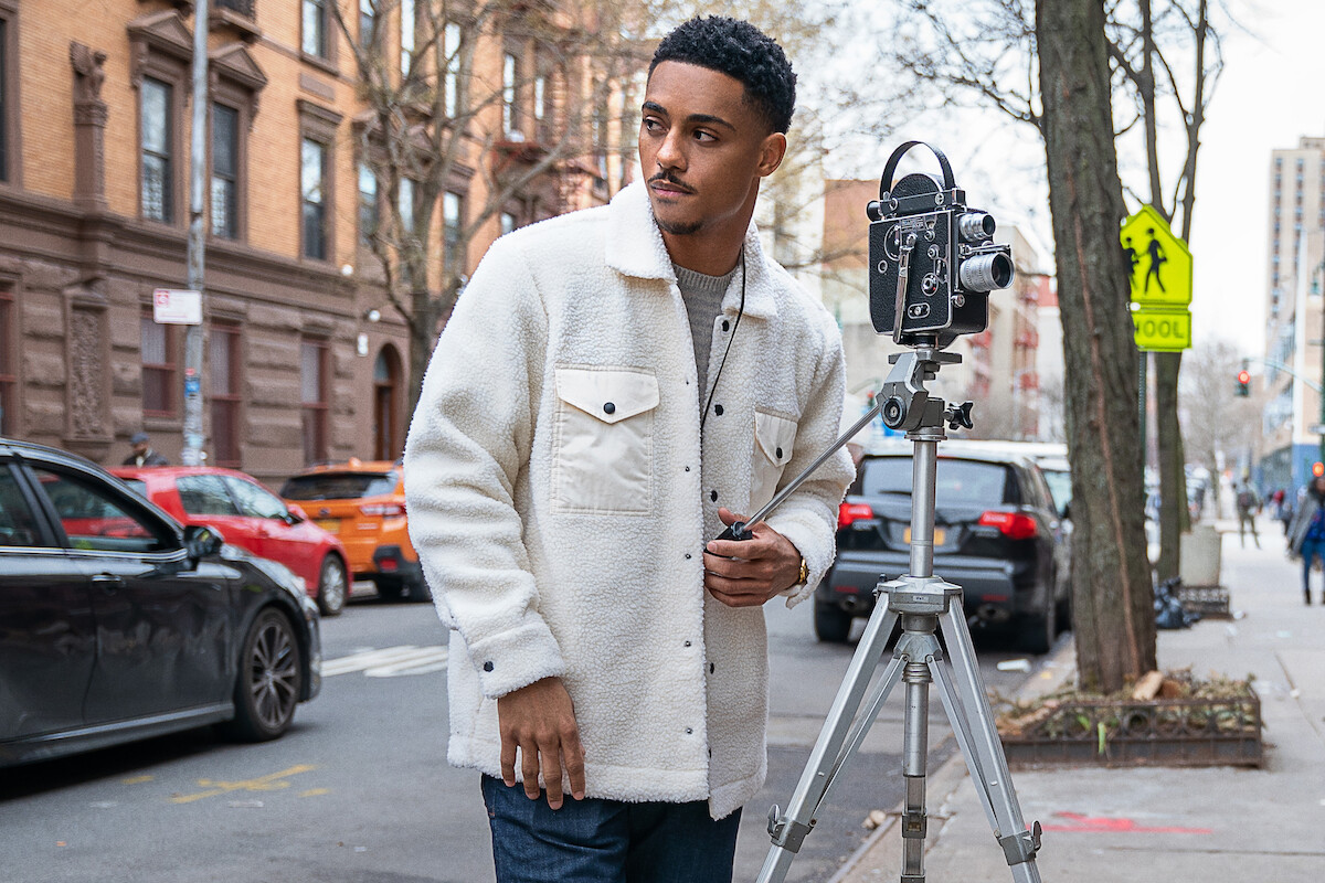 Keith Powers in a white jacket in a still from ‘The Perfect Find.’