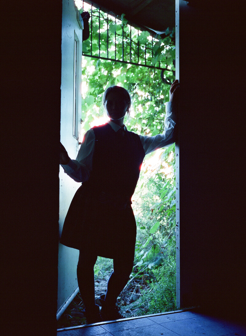 Katherine Kubler standing in a doorway. 