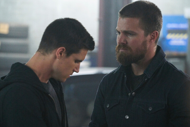 Robbie Amell as Connor Reed and Stephen Amell as Garrett in 'Code 8'