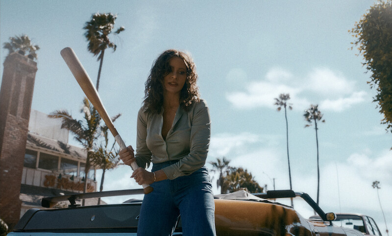 Sofia Vergara as Griselda with a baseball bat