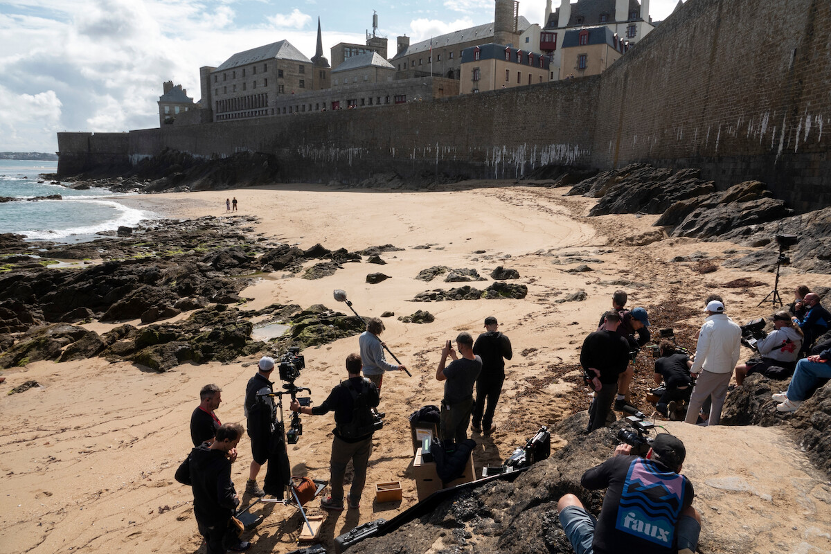 Behind the scenes of filming on the set of All the Light We Cannot See.