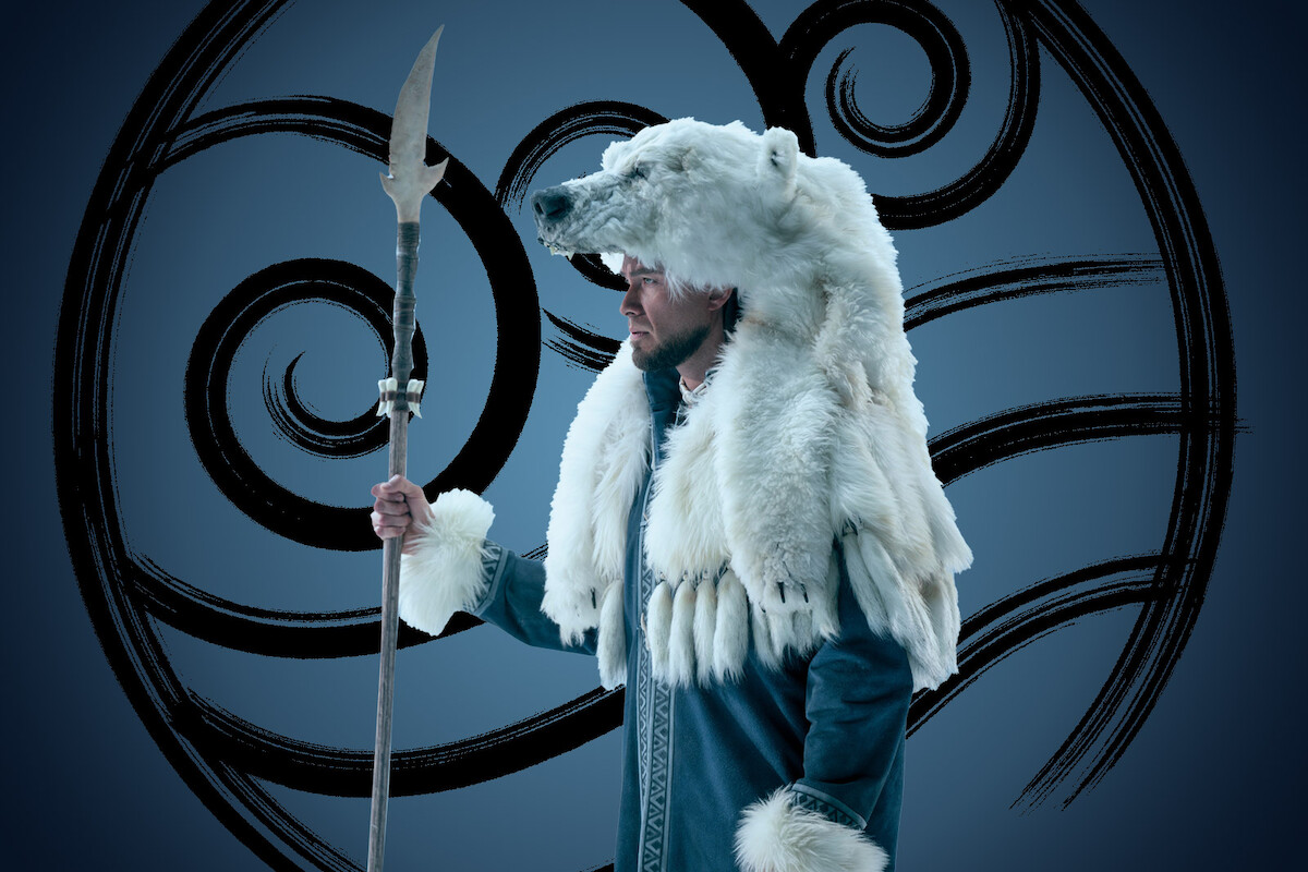 Meegwun Fairbrother as Avatar Kuruk holds a staff in season 1 of ‘Avatar: The Last Airbender’