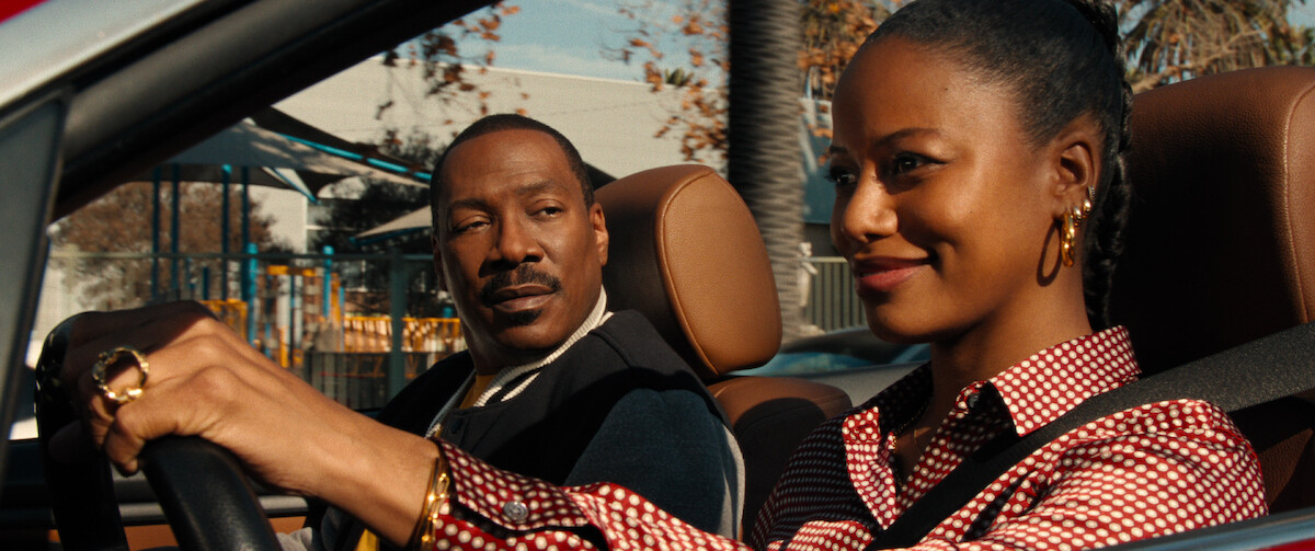 Eddie Murphy as Axel Foley and Taylour Paige as Jane Saunders drive around in ‘Beverly Hills Cop: Axel F.’