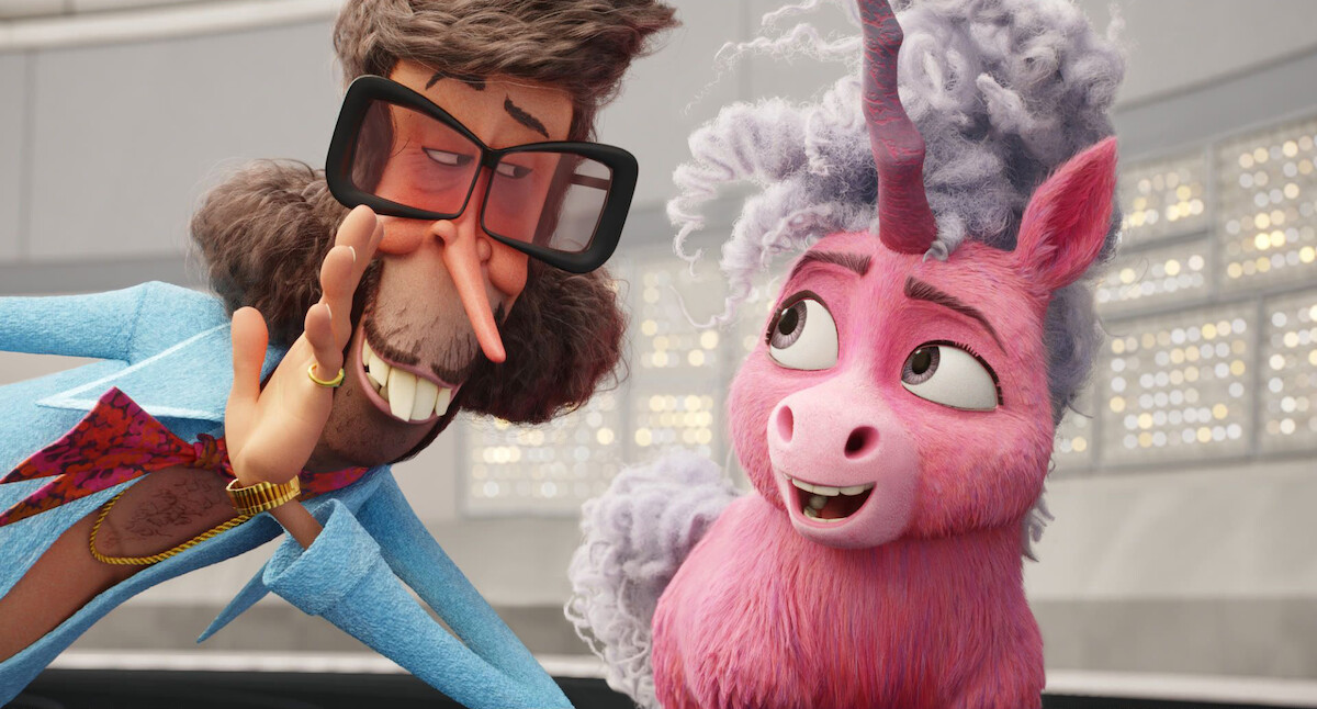 A suited man wearing giant shaded eyeglasses whispers to a pink unicorn in a still from ‘Thelma the Unicorn.’