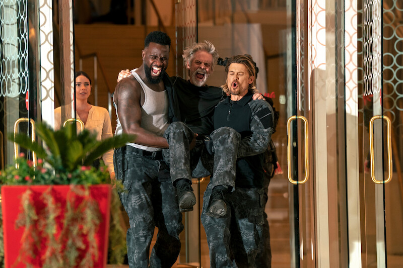 Terrence Terrell as Trunk and Nick Zano as Chad McKnight, carry C. Thomas Howell as Haggerty while everyone is screaming in Season 1 of 'Oblitertated.'