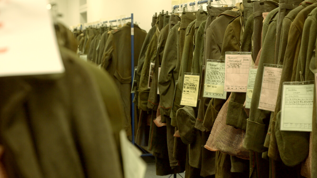 Costume racks full of military uniforms for 'All Quiet on the Western Front.'